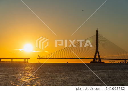 Sunset view of the Danjiang Bridge construction in Tamsui, Taiwan Sunset view of the Danjiang Bridge construction in Tamsui, Taiwan 141095382