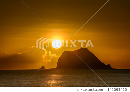 Sunrise behind Keelung Islet in Wanli, New Taipei City, Taiwan Sunrise behind Keelung Islet in Wanli, New Taipei City, Taiwan 141095410