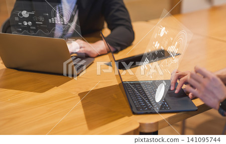 A scene of a business person working on a computer in the office. Works for efficient task management and online meetings. A scene of a business person working on a computer in the office. Works for efficient task management and online meetings. 141095744