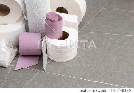 Rolls Of Toilet Paper Towels Hygiene. Roll on gray background copy space Rolls Of Toilet Paper Towels Hygiene. Roll on gray background copy space 141098350
