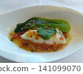 White fish and bok choy with paprika sauce 141099070
