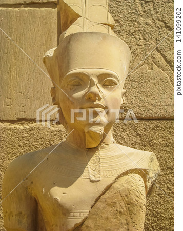 Pharaoh statue in anscient Temple of Karnak in Luxor - Ruined Thebes Egypt Pharaoh statue in anscient Temple of Karnak in Luxor - Ruined Thebes Egypt 141099202