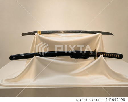 The blade and mounting of the Japanese sword on display. The blade and mounting of the Japanese sword on display. 141099498