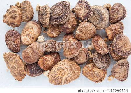 Close-up of dried shiitake mushrooms Close-up of dried shiitake mushrooms 141099704