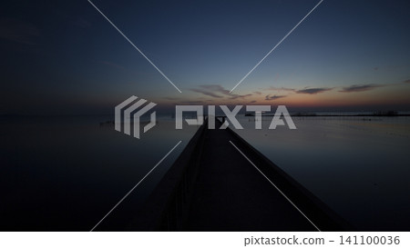 Twilight Lake Pier Silhouette Over Calm Water Twilight Lake Pier Silhouette Over Calm Water 141100036