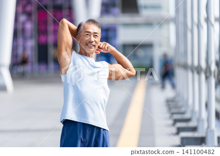 Senior men stretching 141100482