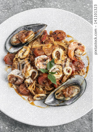 tagliatelle frutti di mare mixed fresh seafood pasta on restaurant table tagliatelle frutti di mare mixed fresh seafood pasta on restaurant table 141101323