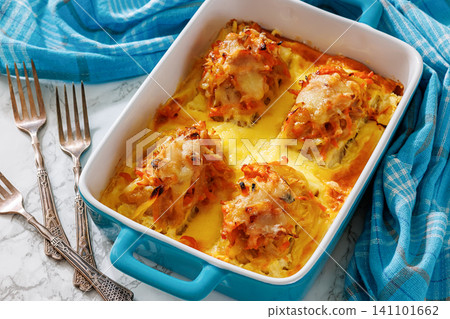Cheesy Veggie Baked White Fish in blue baking dish Cheesy Veggie Baked White Fish in blue baking dish 141101662