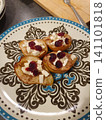 Baked pears with cheese and cranberries Thanksgiving dish 141101818