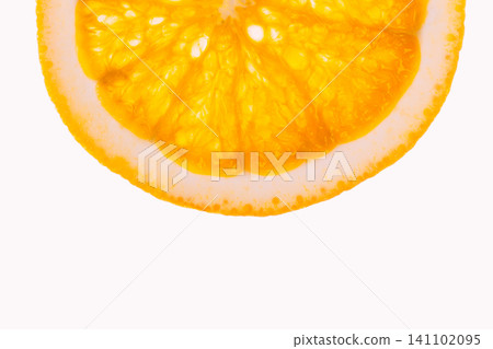 A single fresh orange slice isolated on a white background. A single fresh orange slice isolated on a white background. 141102095