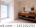 A clean bathroom with a modern wood-grain sink. 141102291