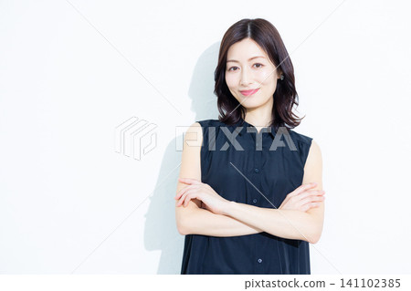 black sleeveless woman black sleeveless woman 141102385