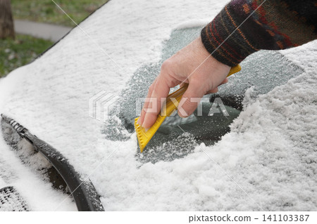 Automotive, ice cleaning from windshield Automotive, ice cleaning from windshield 141103387