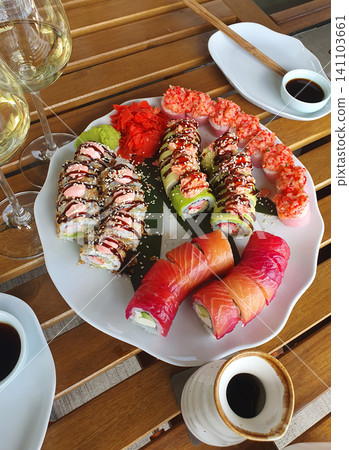 Assorted Gourmet Sushi Platter with Salmon, Tuna and Avocado Rolls Assorted Gourmet Sushi Platter with Salmon, Tuna and Avocado Rolls 141103661
