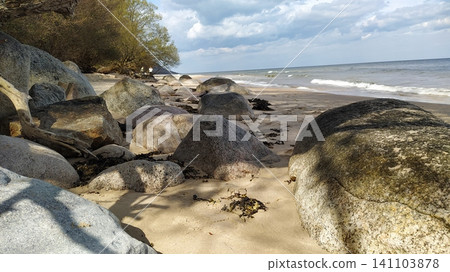 Bounty Beach - Baltic Sea - Sweden - stones on the sand Bounty Beach - Baltic Sea - Sweden - stones on the sand 141103878