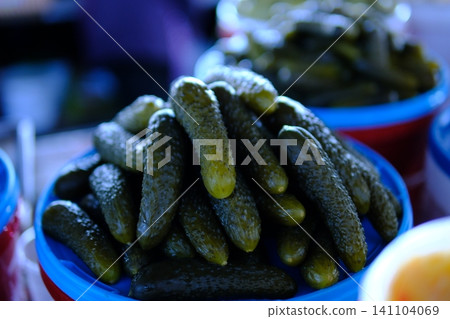 pickled cucumbers at the market. Set of Stack of Crunchy Whole Pickles Gherkins Preserved Food Culinary Ingredient pickled cucumbers at the market. Set of Stack of Crunchy Whole Pickles Gherkins Preserved Food Culinary Ingredient 141104069