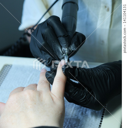 Natural nail recovery after damaged gel polish removal in professional manicure salon. renews weakened nails for healthy natural beauty. Natural nail recovery after damaged gel polish removal in professional manicure salon. renews weakened nails for healthy natural beauty. 141104131