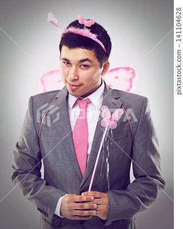 Smile, costume and man with idea of magic in business as entrepreneur in corporate startup. Adult, male person and guy in suit, professional and fairy for Halloween party in company in studio Smile, costume and man with idea of magic in business as entrepreneur in corporate startup. Adult, male person and guy in suit, professional and fairy for Halloween party in company in studio 141104628