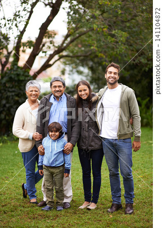 Family, smile and portrait in garden or backyard for relationship, grandparents and child with mom and dad for joy. Group, senior people and kid for bonding, love and happiness together in park Family, smile and portrait in garden or backyard for relationship, grandparents and child with mom and dad for joy. Group, senior people and kid for bonding, love and happiness together in park 141104872