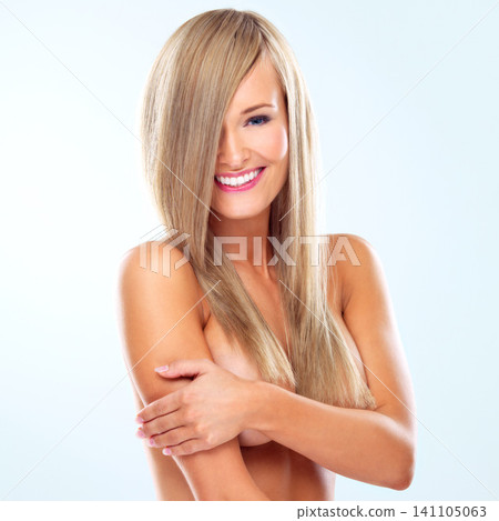 Hair care, naked and portrait of happy woman for skincare, makeup or body isolated on blue studio background. Hairstyle, face and smile of nude blonde model in cosmetics at salon, hairdresser or sexy Hair care, naked and portrait of happy woman for skincare, makeup or body isolated on blue studio background. Hairstyle, face and smile of nude blonde model in cosmetics at salon, hairdresser or sexy 141105063