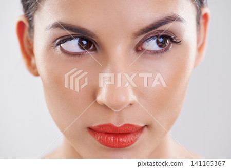 Woman, beauty and thinking in studio of makeup, dermatology and skin care on a white background. Closeup and face of a young model or person with facial foundation and inspiration or cosmetics ideas Woman, beauty and thinking in studio of makeup, dermatology and skin care on a white background. Closeup and face of a young model or person with facial foundation and inspiration or cosmetics ideas 141105367