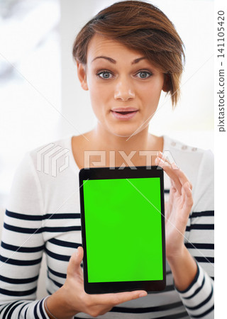 Woman, surprise and tablet for mockup, green screen and advertising online for technology or app user. Information, news or announcement on internet, digital marketing and web ads with UX at home Woman, surprise and tablet for mockup, green screen and advertising online for technology or app user. Information, news or announcement on internet, digital marketing and web ads with UX at home 141105420