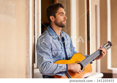 Guitar, music and instrument for thoughtful male person, outside on patio or veranda. Acoustic, singer and talent for man musician for entertainment, enjoyment and pensive on holiday or vacation Guitar, music and instrument for thoughtful male person, outside on patio or veranda. Acoustic, singer and talent for man musician for entertainment, enjoyment and pensive on holiday or vacation 141105455