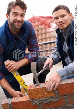 Construction worker, bricklayer and men with tools for building a brick wall, handyman or contractor with mentor and apprentice. Team, builder with maintenance or renovation for training in industry Construction worker, bricklayer and men with tools for building a brick wall, handyman or contractor with mentor and apprentice. Team, builder with maintenance or renovation for training in industry 141105622