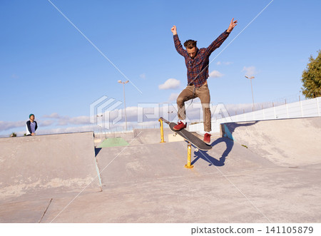 Fitness, freedom and man with skateboard, jump or rail balance at a skate park for stunt training. Energy, adrenaline and gen z male skater with air, sports or skill practice, exercise or performance Fitness, freedom and man with skateboard, jump or rail balance at a skate park for stunt training. Energy, adrenaline and gen z male skater with air, sports or skill practice, exercise or performance 141105879