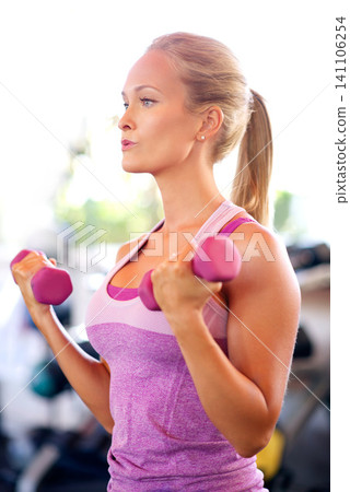 Breathing, fitness and woman with weights in gym with arm workout for wellness, health and muscle strength. Dumbbells, exercise and female athlete with with equipment for training in sports center. Breathing, fitness and woman with weights in gym with arm workout for wellness, health and muscle strength. Dumbbells, exercise and female athlete with with equipment for training in sports center. 141106254