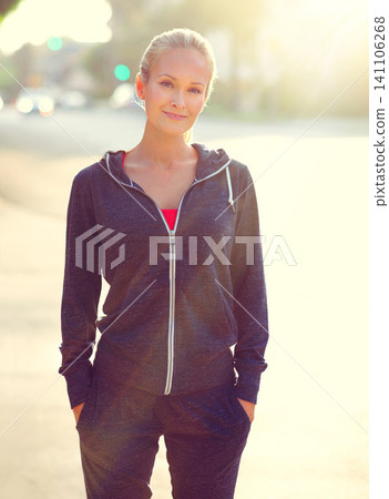Happy woman, portrait and city with confidence for fitness, exercise or outdoor workout. Female person, blonde or athlete in proud happiness for health and wellness in the street of an urban town Happy woman, portrait and city with confidence for fitness, exercise or outdoor workout. Female person, blonde or athlete in proud happiness for health and wellness in the street of an urban town 141106268