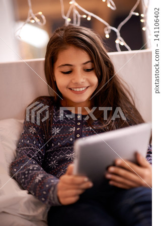 Girl, kid and tablet, technology and communication with ebook for reading and social media at home. Elearning, movie or storytelling app with internet, browsing and digital platform for gaming Girl, kid and tablet, technology and communication with ebook for reading and social media at home. Elearning, movie or storytelling app with internet, browsing and digital platform for gaming 141106402