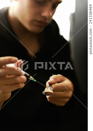 Man, syringe and spoon for heroin drug as unhealthy addiction or mental health struggle, danger or needle. Male person, hand and preparation of habit vice or depression overdose, anxiety or injection Man, syringe and spoon for heroin drug as unhealthy addiction or mental health struggle, danger or needle. Male person, hand and preparation of habit vice or depression overdose, anxiety or injection 141106464