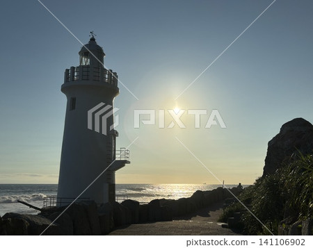 Lighthouse bathed in the setting sun Lighthouse bathed in the setting sun 141106902