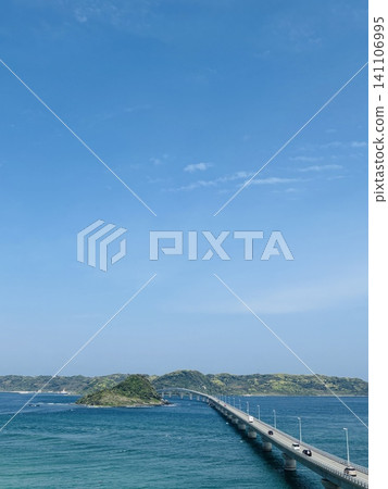 Tsunoshima Bridge stretches across the cobalt blue sea in Shimonoseki City, Yamaguchi Prefecture. Tsunoshima Bridge stretches across the cobalt blue sea in Shimonoseki City, Yamaguchi Prefecture. 141106995
