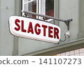Butcher sign on a wall called slagter in Danish language 141107273