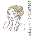 A woman smiling with his hand on her cheek 141107306