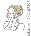 A woman with her hand on her cheek looks troubled. 141107307