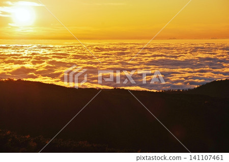 Sunset over the sea of clouds Sunset over the sea of clouds 141107461