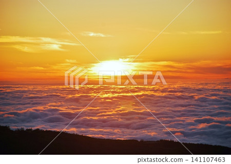 Sunset over the sea of clouds Sunset over the sea of clouds 141107463