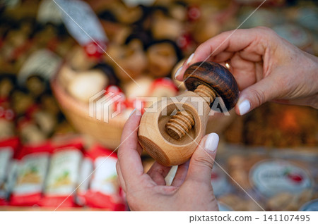 Crafting wooden toys at a market in Prague during the day Crafting wooden toys at a market in Prague during the day 141107495