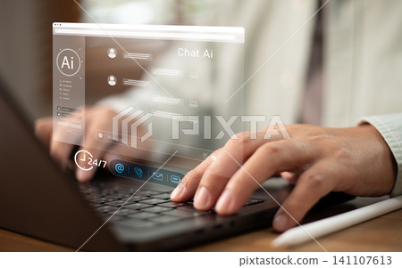 Businessperson typing on laptop with virtual Chat AI assistant web interface window for automated customer service, online support chat bot, smart virtual helpdesk 24 7 assistance technology concept Businessperson typing on laptop with virtual Chat AI assistant web interface window for automated customer service, online support chat bot, smart virtual helpdesk 24 7 assistance technology concept 141107613
