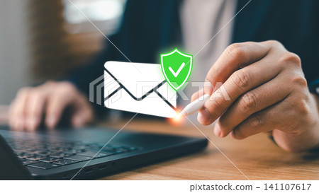 Businessman using stylus pen with secure email icon shield for cyber security, data privacy protection, verified electronic mail network, phishing defense and corporate safety tech concept Businessman using stylus pen with secure email icon shield for cyber security, data privacy protection, verified electronic mail network, phishing defense and corporate safety tech concept 141107617