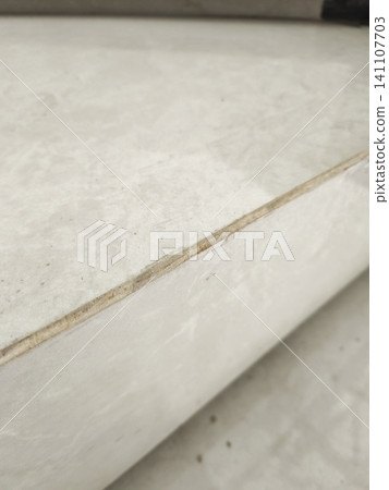 Surface texture of cream white ceramic tile with veins. Surface texture of cream white ceramic tile with veins. 141107703