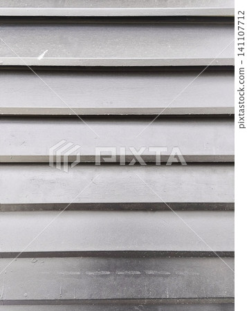 Horizontal shiplap wood wall texture in charcoal gray. 141107712