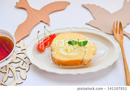 Roll cake with cherries and mint Roll cake with cherries and mint 141107852