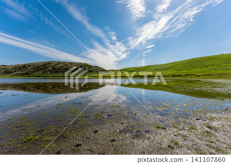 Japan: A blue sky and the majestic Kusasenri Beach at Mount Aso in Kumamoto. 141107860