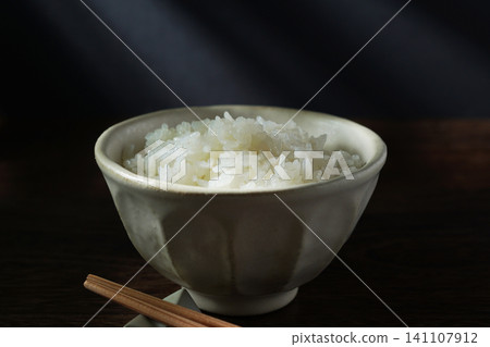 White rice served in a bowl. White rice served in a bowl. 141107912