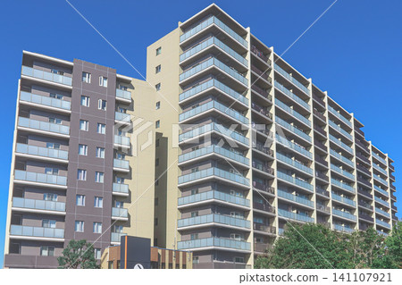 High-rise apartment buildings and a refreshing blue sky High-rise apartment buildings and a refreshing blue sky 141107921