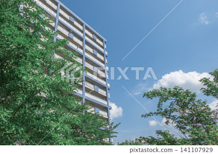 High-rise apartment buildings and a refreshing blue sky 141107929
